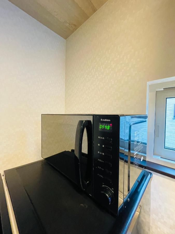 Niseko Hotel Kiraku Kou Экстерьер фото